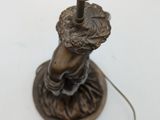 an image of a lamp that is on top of a table