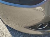 a close up view of a car ' s exhaust pipe
