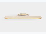 an image of a gold tie bar on a white background
