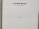 an open book with a black and white title on it
