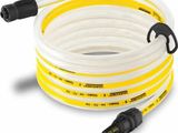 un tuyau blanc et jaune muni d'un raccord noir
