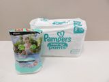 a bag of diapers and a bag of diapers on a table