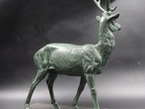 bronze sculpture of a stag on a marble base