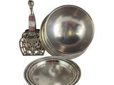 a silver plate with a bottle of wine in it