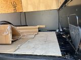 a box on the back of a truck with a box on the back of it