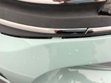 a close up of the front bumper of a car