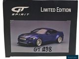 a picture of a blue sports car in a box