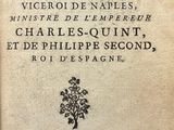 an old book with writing on it sitting on a table
