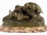 bronze sculpture of a dog attacking a lion on a marble base