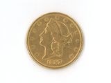 a gold coin with a profile of a woman on it