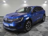 a blue suv parked on a checkered floor in a garage