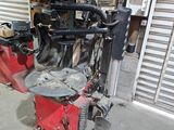 an image of a machine that is sitting in a garage