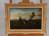 painting on easel of a painting of a military scene with a man on horseback