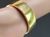 gold plated brass cuff bracelet with a wide band