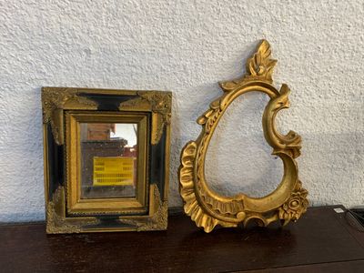 a picture of a picture frame and a picture frame on a shelf