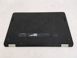 a laptop that is sitting on a white surface