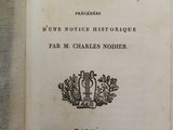 un vieux livre avec l'image d'un homme dessus