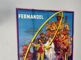 a large poster of a man holding a sword in front of a group of people