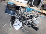 a pile of electronic equipment sitting on a pallet