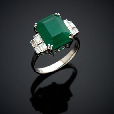 an emerald and diamond ring