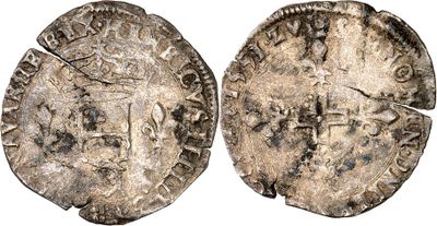 une pièce d'argent portant l'image d'un homme
