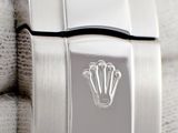 a close up of a watch that is on display