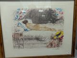 framed drawing of a nude woman laying on a bed with a hat