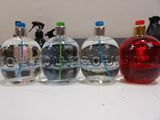 bottles of various types of cleaning products lined up on a table