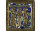 an image of a gold and blue tile with a picture of a group of people