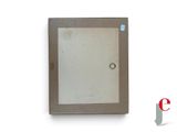 a picture of a mirror on a wall with a ring on it