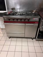 PIANO de CUSSON AMBASSADE à gaz en inox, à feu central flanq…
