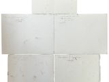 four pieces of white paper with writing on them sitting on top of each other