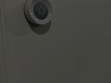 a digital thermosta on the wall of a bathroom