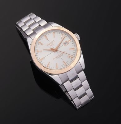 an image of a close up of a wrist watch on a black surface