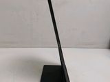 an image of a black tablet computer sitting on top of a table