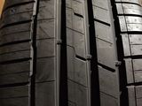 a close up of a tire on a cardboard box