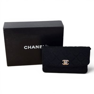 chanel black quilted clutch bag