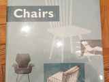 une image représentant un livre sur lequel figure l'illustration d'une chaise