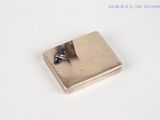 sterling silver ring with blue sapphire stone set in a square box