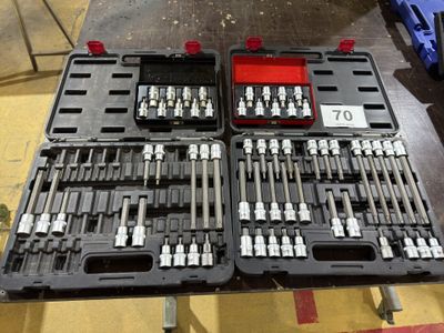 many tools in the trays on the table