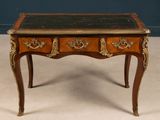 a small table with a marble top on it