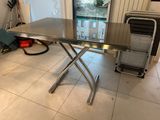 a table that is sitting in the middle of a room