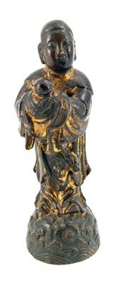 statue of a woman holding a baby in her arms