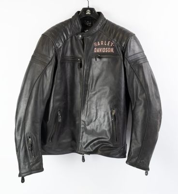 a black leather jacket with a harley davidson patch on the back