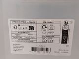 a label on the back of a white refrigerator
