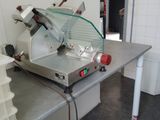 a machine that is sitting on a table in a kitchen