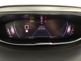 the dashboard of a car with a digital display on it