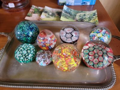 a tray that has a bunch of glass marbles on it