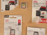 many different types of sandisk cards on the table