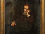 a painting of an old man with a red turban sitting in a chair